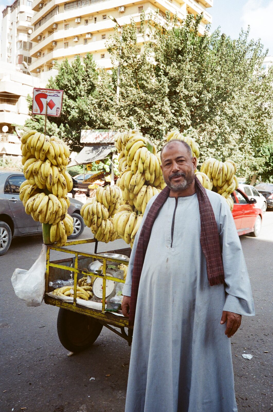 Banana seller with his cart in a street — Omar Abulata for ZELZAL