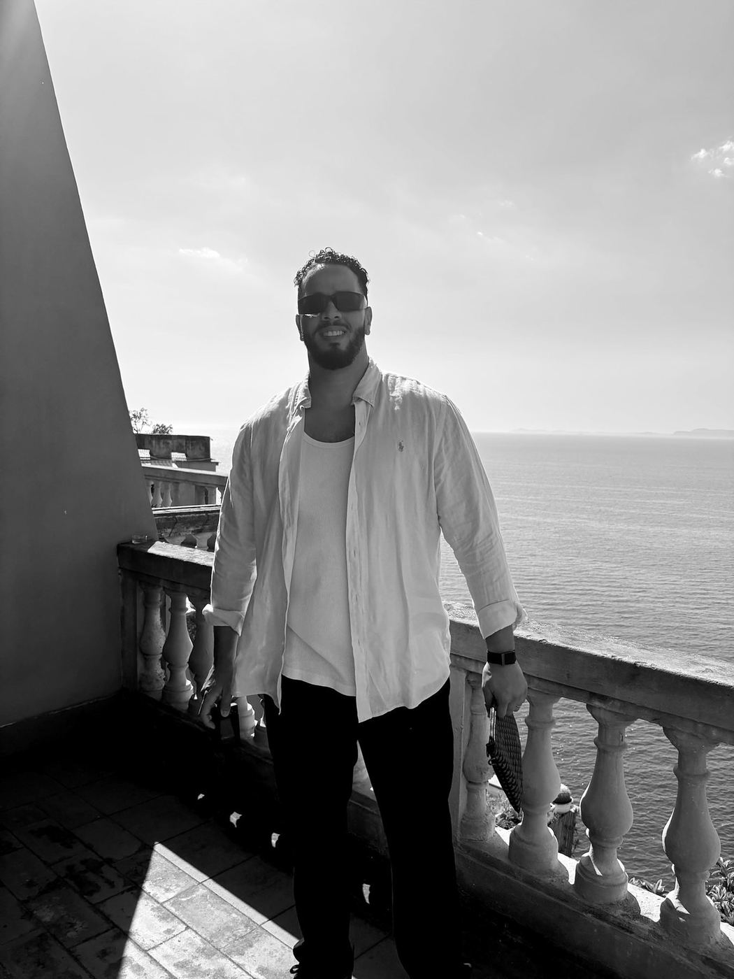 Black-and-white portrait of Yassine Taha