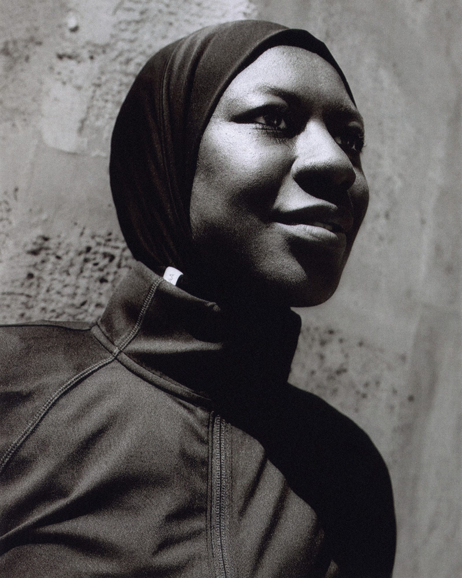 OPEN PLAY: runner in hijab smiling